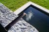 Badebrunnen: Ein Brunnen im Garten, der zur Erfrischung an heissen Tagen dient.