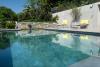 Folienpool mit quadratischen Bodenplatten
